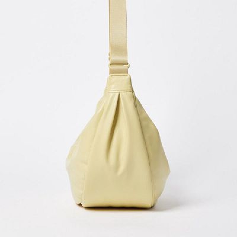 Yellow Uniqlo Faux Leather Round Women Crossbody Bags | 6899603